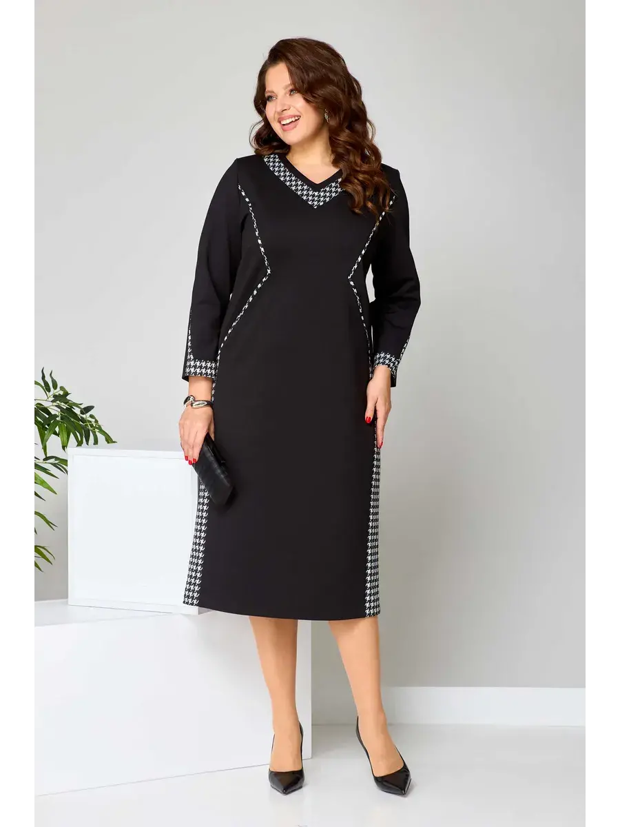 Elegancka sukienka midi o fasonie modelującym sylwetkę